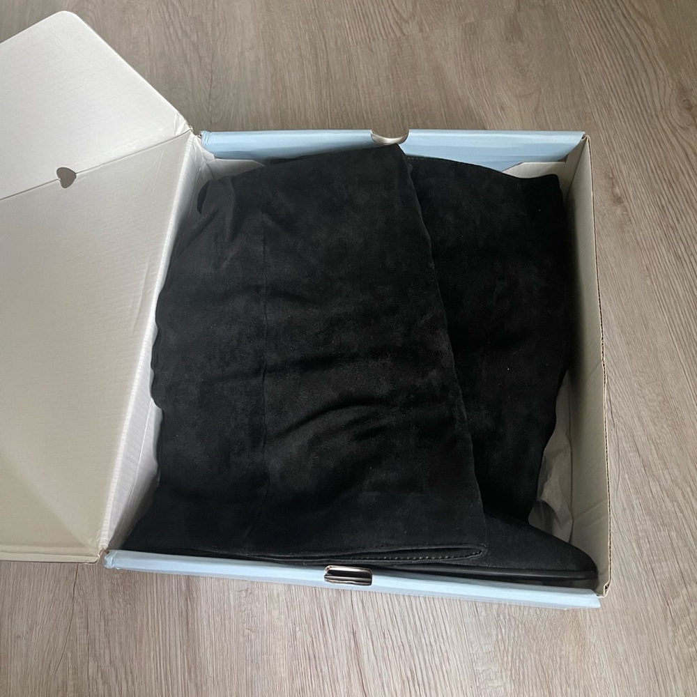 Brand new still in box knee high boots